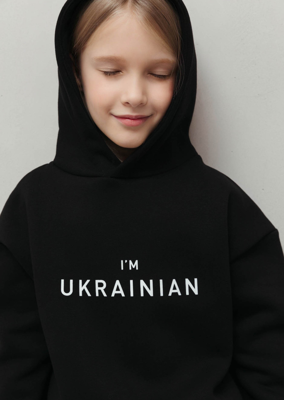 Black color kids three-thread insulated hoodie with print "I'm Ukrainian"
